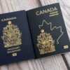 two canadian passports side by side