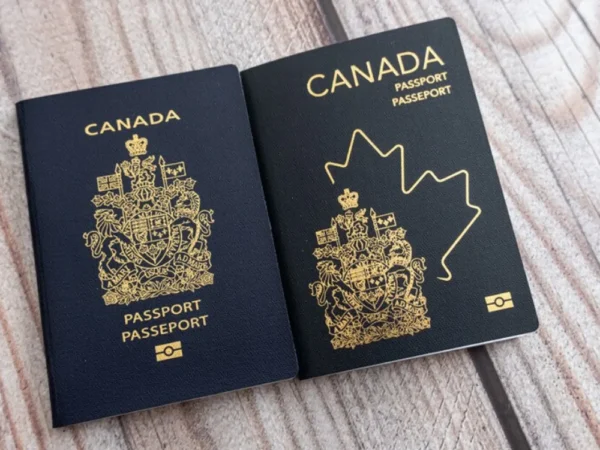 two canadian passports side by side